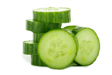 heap of slices of cucumber isolated on white
