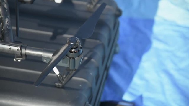 Man attaching a propeller / prop to a UAV drone