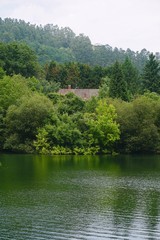 Fototapeta na wymiar river and house in the mountain 