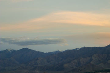 evening pink sky over a mountain valley