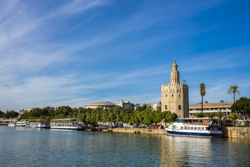 Fototapeta na wymiar Torre del Oro or Tower of Gold is a dodecagonal military watchtower in Seville, southern Spain.