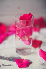 Rose petals in a bowl of water
