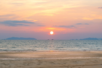 Sunset at the long beach named Ao Yai. Romanticism on the island Ko Phayam in Thailand