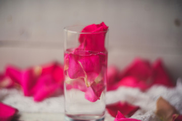 Rose petals in a bowl of water