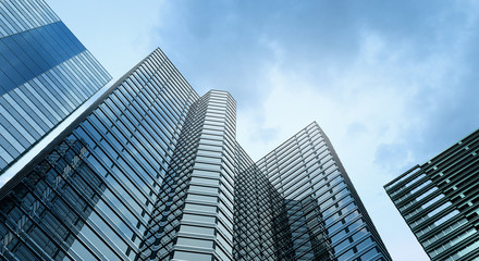 Fototapeta na wymiar Modern building office and blue sky background