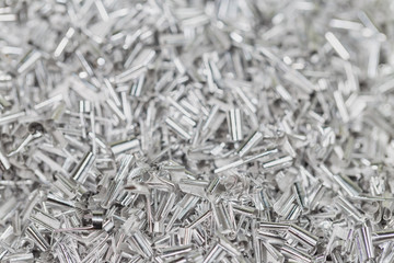 Aluminum shavings. exture of aluminum chips. Selective Focus