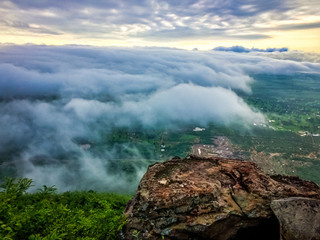 Khao PraYa DernThong Mountain.Lopburi Thailand.Rock on The Mountain in the cloud and fog