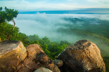 Obraz premium Khao PraYa DernThong Mountain.Lopburi Thailand.Rock on The Mountain in the cloud and fog