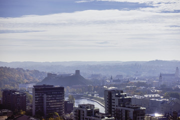 Fototapeta premium Lithuania, Vilnius cityscape in foggy autumn day