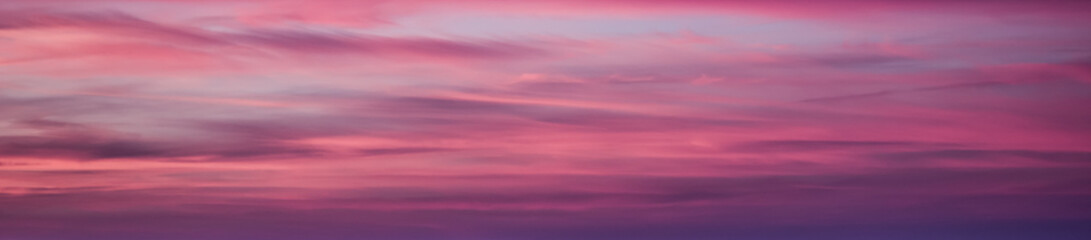 Sunset orange blue pink sky with clouds 