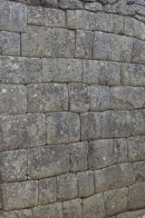 An ancient wall of the inca civilization in Machu Pichuu Cuzco, Peru