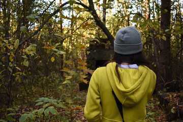 Fototapeta premium A lady came across an old stack of bricks or rocks known by the locals as the 