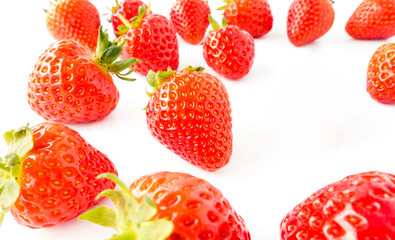 Closeup of Fresh Strawberries on White