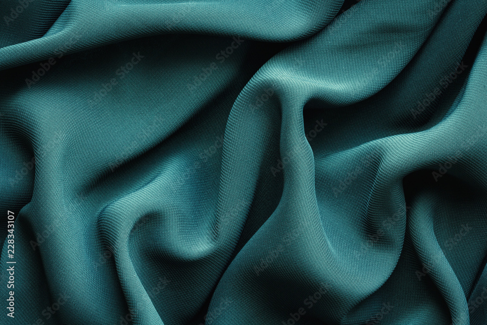 Wall mural green fabric with large folds, abstract background