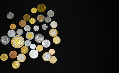 Money from different countries. Metal ancient coins. Copper, silver and gold coins. Wealth and abundance. Trifle. Love of money. Prosperity and wealth. Cup of plenty. Capital.
