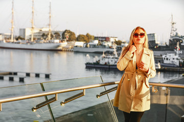 Slim young woman and autumn time 