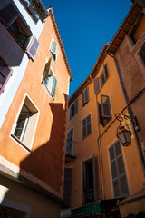 Fototapeta na wymiar Colourful Houses with shutters, Vence, Provence