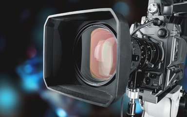 Television Camera lens on blur background