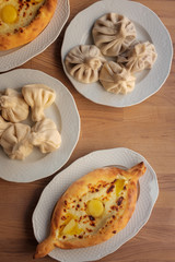 Khachapuri and khinkali on a plate. National Georgian dish