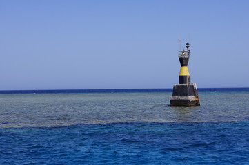 lighthouse on sea