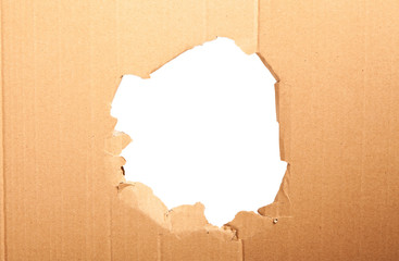 Cardboard with a hole - white background