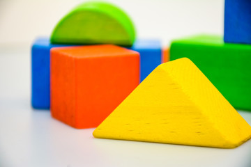 Yellow triangle building block closeup