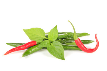 heap of chili pepper with leaves isolated on white background