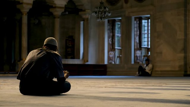 Man Praying Inside The Mosque 