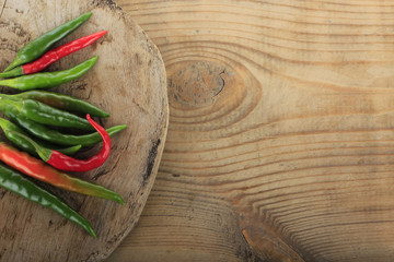 heap of chili pepper on wooden background