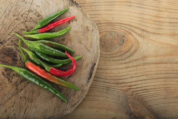 heap of chili pepper on wooden background