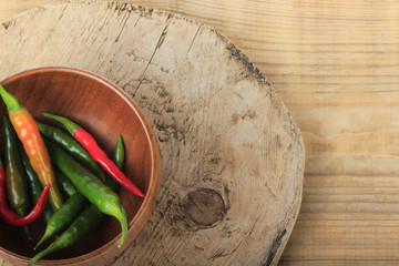 heap of chili pepper on wooden background