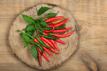 heap of red chili pepper on wooden background