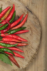 heap of red chili pepper on wooden background