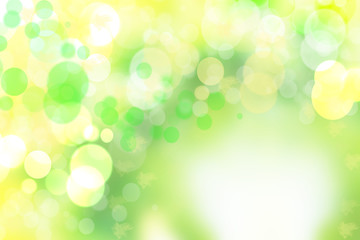 bstract colorful gradient yellow green bokeh lights background texture.