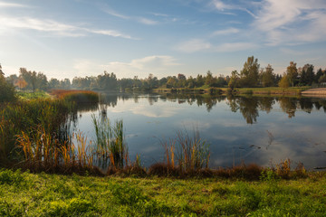Fototapeta na wymiar Lake Zgorzala in district Ursynow at autumn, Warsaw, Poland