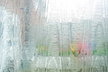 Closeup of Glassy window texture pattern background, sun light seen through the glass