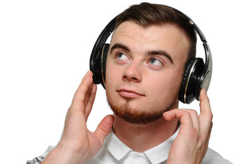 young man. hipster, in headphones, listening to music, positive emotions. Isolated on white