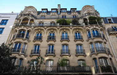 Fototapeta premium The traditional facade of Parisian building, France.
