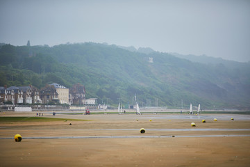 Buoys on beach of Villers-sur-Mer in Lower Normandy