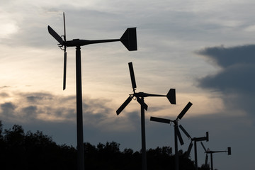 View of the wind turbine at sunset