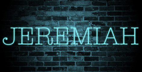 Fototapeta na wymiar first name Jeremiah in blue neon on brick wall