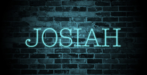 first name Josiah in blue neon on brick wall