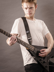 Man playing on electric guitar