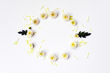 Paper frame with flower on white texture background. Greeting card.