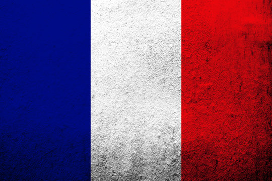 The national flag of France. Grunge background
