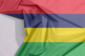 Mauritius fabric flag crepe and crease with white space, Four horizontal bands of red blue yellow and green.