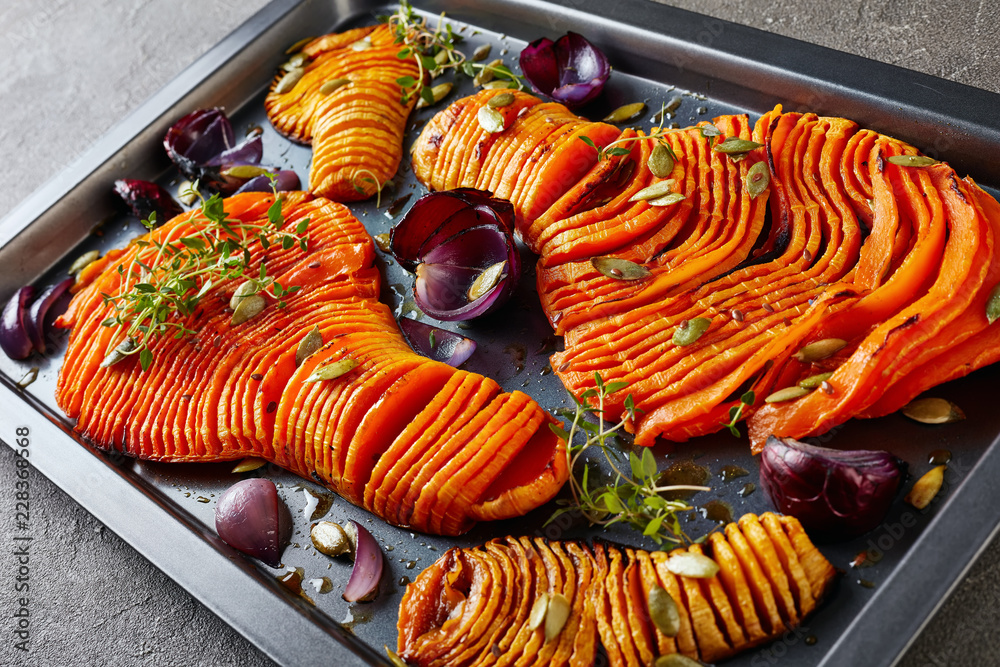 Poster thinly sliced halves of Butternut pumpkin