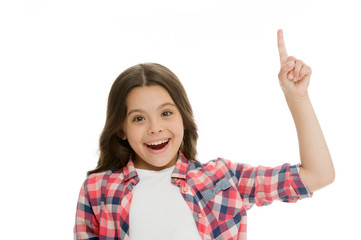 Kid point finger up isolated white. Child cute face brunette hair pointing upwards. Girl casual look recommend check this out. This direction. Subscribe or check. Push button turn on notification