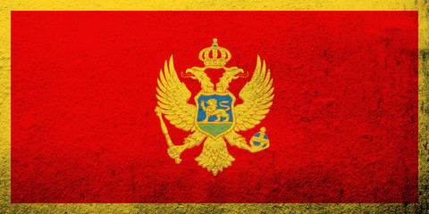 National flag of Montenegro. Grunge background