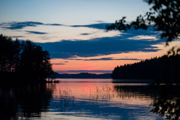 Fototapeta na wymiar Finnish lakeside sunset scenery